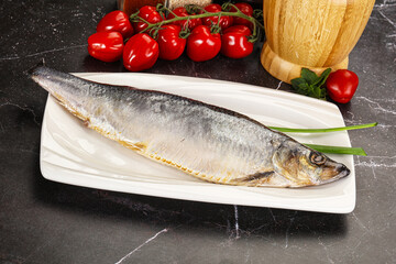 Whole raw salted herring fish