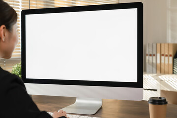 Businesswoman using computer and hand type on the keyboard, Mockup screen of advertisement.