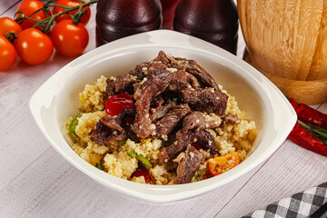 Traditional couscous with beef and vegetables