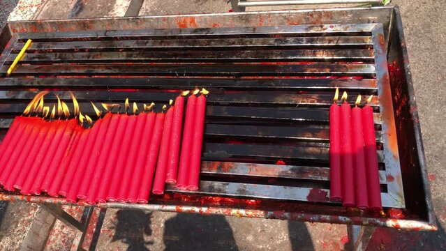 Red candle Used for worshiping Thao Wessuwan or the gods.