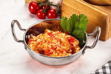 Shakshuka with tomato for breakfast
