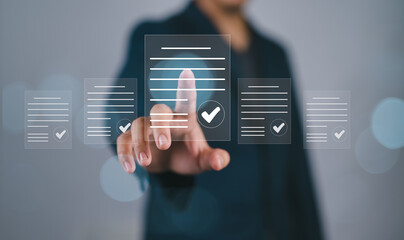 Electronic signature concept. Businessman sign electronic documents in digital documents, Signing contract to approve a business project, paperless document office.
