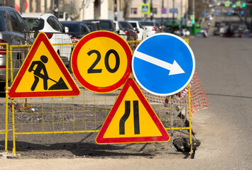Restrictive road signs on the road during repair work