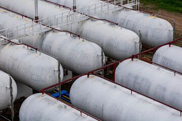 Storage tank of gas LPG in the horizontal white tank's