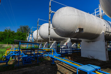 Storage tank of gas LPG in the horizontal white tank's