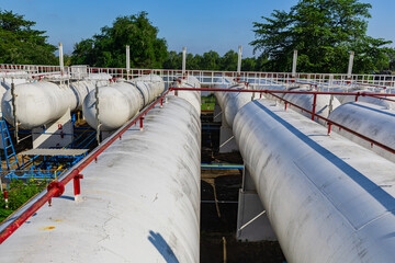 Storage tank of gas LPG in the horizontal white tank's