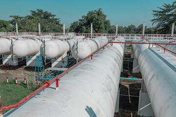 Storage tank of gas LPG in the horizontal white tank's