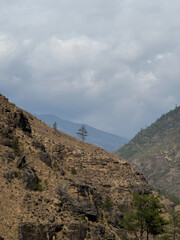 Landscape image of Bhutan with mountainous peaks and valleys
