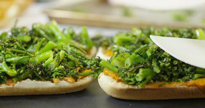 Adding cheese to broccolini Philly cheesesteak