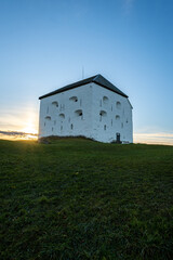 Fototapeta premium Kristiansten fortress in Trondheim Norway on a grassy hill at summertime.