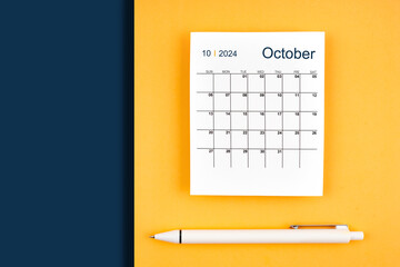 October 2024 calendar card for 2024 year on blue and yellow background.