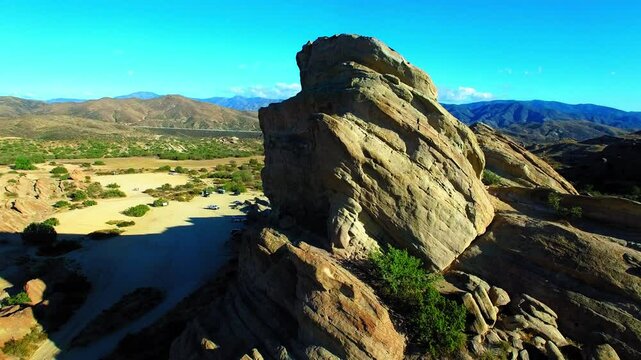 Aerial: Drone Panning Shot Of Vasquez Rocks In Semi Arid Tranquil Desert On Sunny Day - Agua Dulce, California