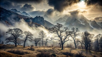 Fototapeta premium Moody mist-shrouded mountainscape with eerie fog, barren trees, and a sense of foreboding, evoking intensity and dramatic tension.