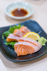 Japanese raw salmon slice or salmon sashimi in japanese style.