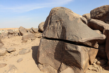 Ancient egyptian inscriptions and hieroglyphs on Famine stela in Aswan, Egypt