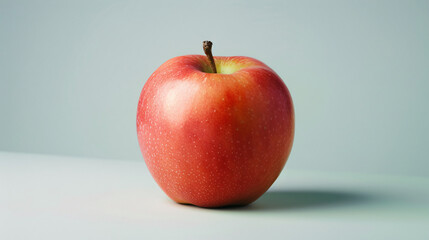 Juicy delicious fresh apple on a gradient background. Autumn garden fruit, red apple, real apple isolated on gradient background.