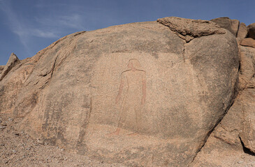 Ancient egyptian carvings on granite rocks near Famine Stela in Aswan, Egypt 
