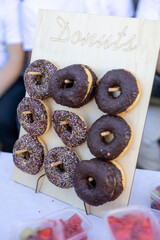 various donuts on a stand