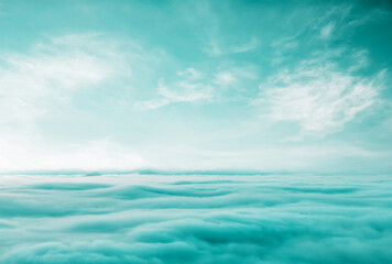 Blue sky with some clouds. View over the clouds.ummer blue sky cloud gradient light white background. Beauty clear cloudy in sunshine calm bright winter air bacground. Gloomy vivid cyan landscape