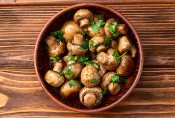 Fried mushroom champignon with onion and parsley