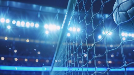 Obraz premium Goal moment at a night soccer match with stadium lights