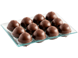 Chocolate a selection of chocolate bonbons with various fillings on a transparent glass dish assorted