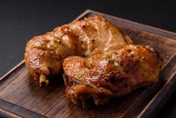 Delicious grilled chicken leg or quarter with salt and spices