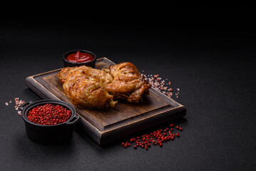 Delicious grilled chicken leg or quarter with salt and spices