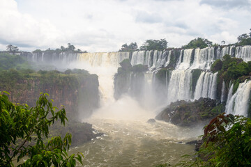Fototapeta premium Tropical landscape with falls ending in the river at the Iguazu Falls in Argentina