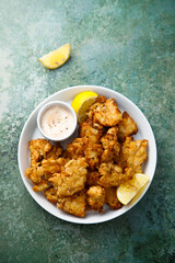 Traditional homemade chicken nuggets with sauce