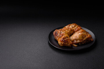 Delicious grilled chicken leg or quarter with salt and spices