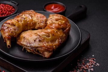 Delicious grilled chicken leg or quarter with salt and spices