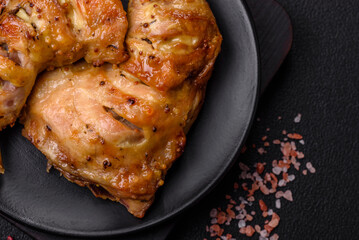 Delicious grilled chicken leg or quarter with salt and spices