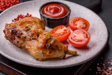 Delicious grilled chicken leg or quarter with salt and spices