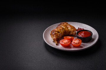 Delicious grilled chicken leg or quarter with salt and spices