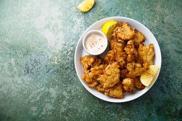 Traditional homemade chicken nuggets with sauce