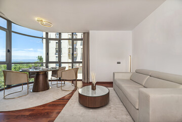 Use modern designs such as minimalist chairs and tables with straight lines and smooth surfaces