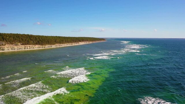 4K panoramic aerial video from flying drone to Panga coastal cliff and lighthouse , northern shore of Saaremaa island, near Kuressaare, Baltic Klint.Saaremaa , Estonia
