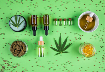 Marijuana leaves, bottle of oil, cannabis on cbd concept
