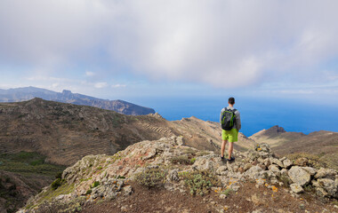 Boy hiking in the Teno Rural Park on the island of Tenerife.