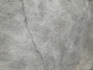 Gray grunge cement wall texture with crack, background for web site or mobile devices
