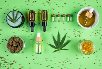 Marijuana leaves, bottle of oil, cannabis on cbd concept