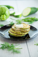 zucchini fried in batter with sauce