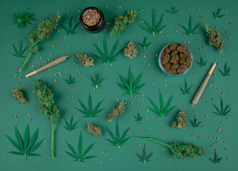 Top view of marijuana leaves and cannabis buds, cbd concept