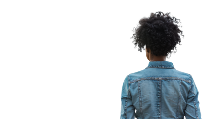 Woman with curly hair walks away in denim jacket, cut out - stock png.