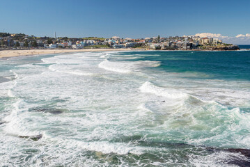 Picturesque golden sandy Bondi Beach in Sydney. Bondi beach is perfect place for surfers due to constantly rising high waves.
