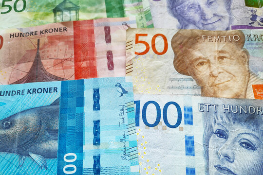 Close-up on a stack of Norwegian krone and Swedish Krona.