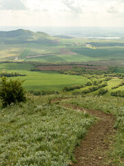 Ceske Stredohori hill range-Central Bohemian Uplands or Central Bohemian Highlands and protected landscape,aerial scenic panorama mountains view,Mila hill,Czech republic by Louny Town,Europe