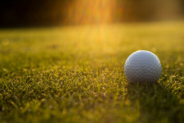 Golf course with ball and grass