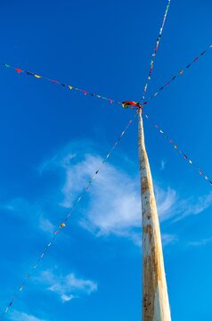 Multi-colored string flags in the sky